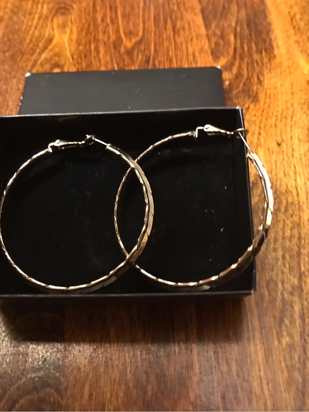 Avon Gold Twisted Hoop Earrings